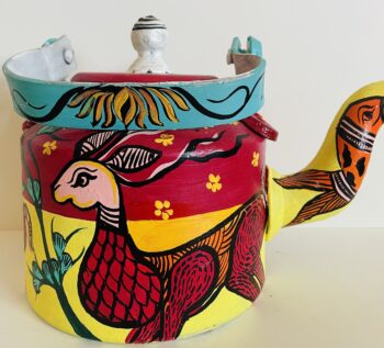 Tribal art kettle deer and fish